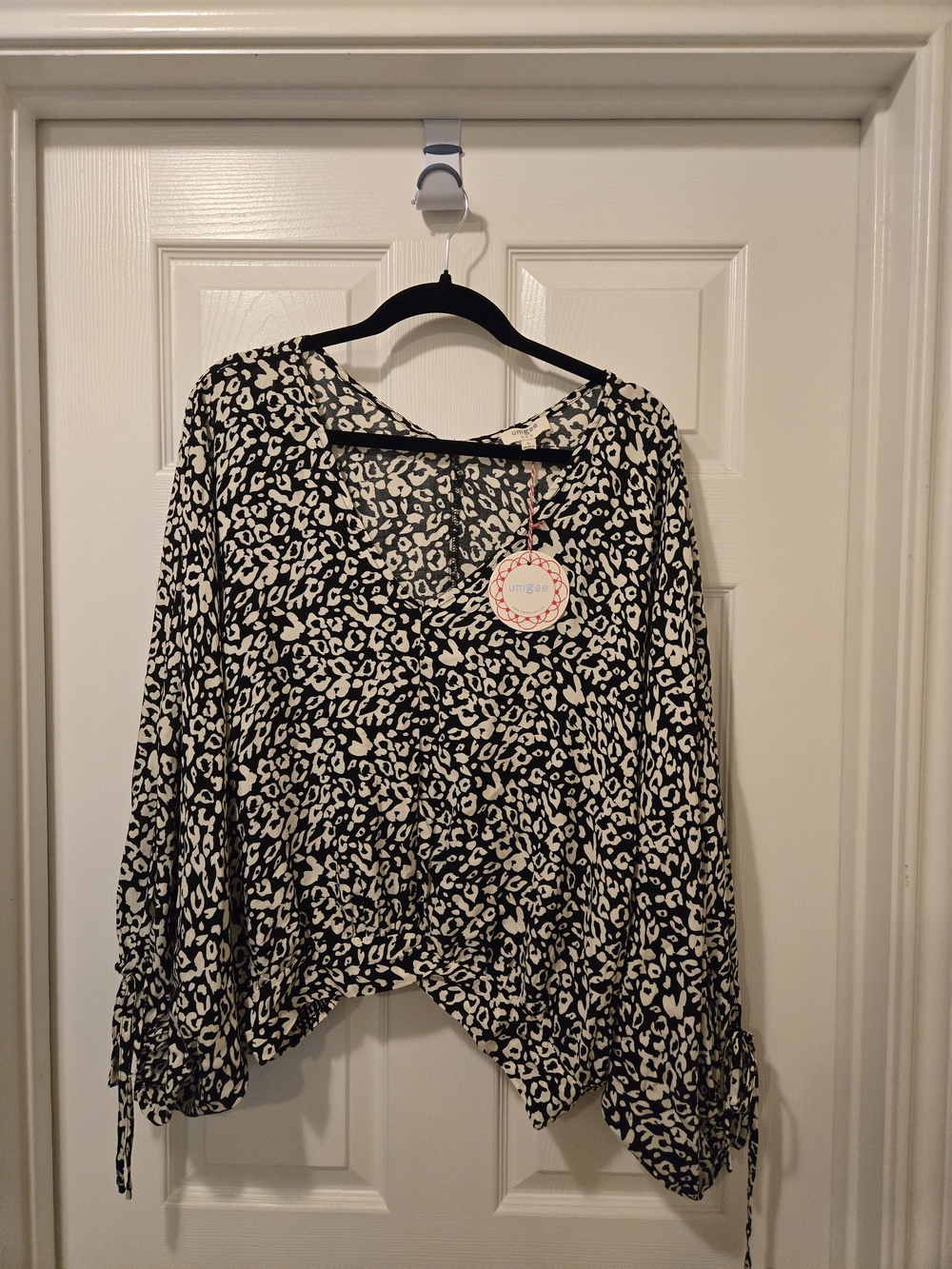 Umgee Black and White Leopard Print V-Neck Blouse